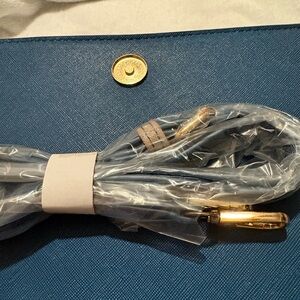 Trina Turk Blue and Tan Handbag with Gold Logo